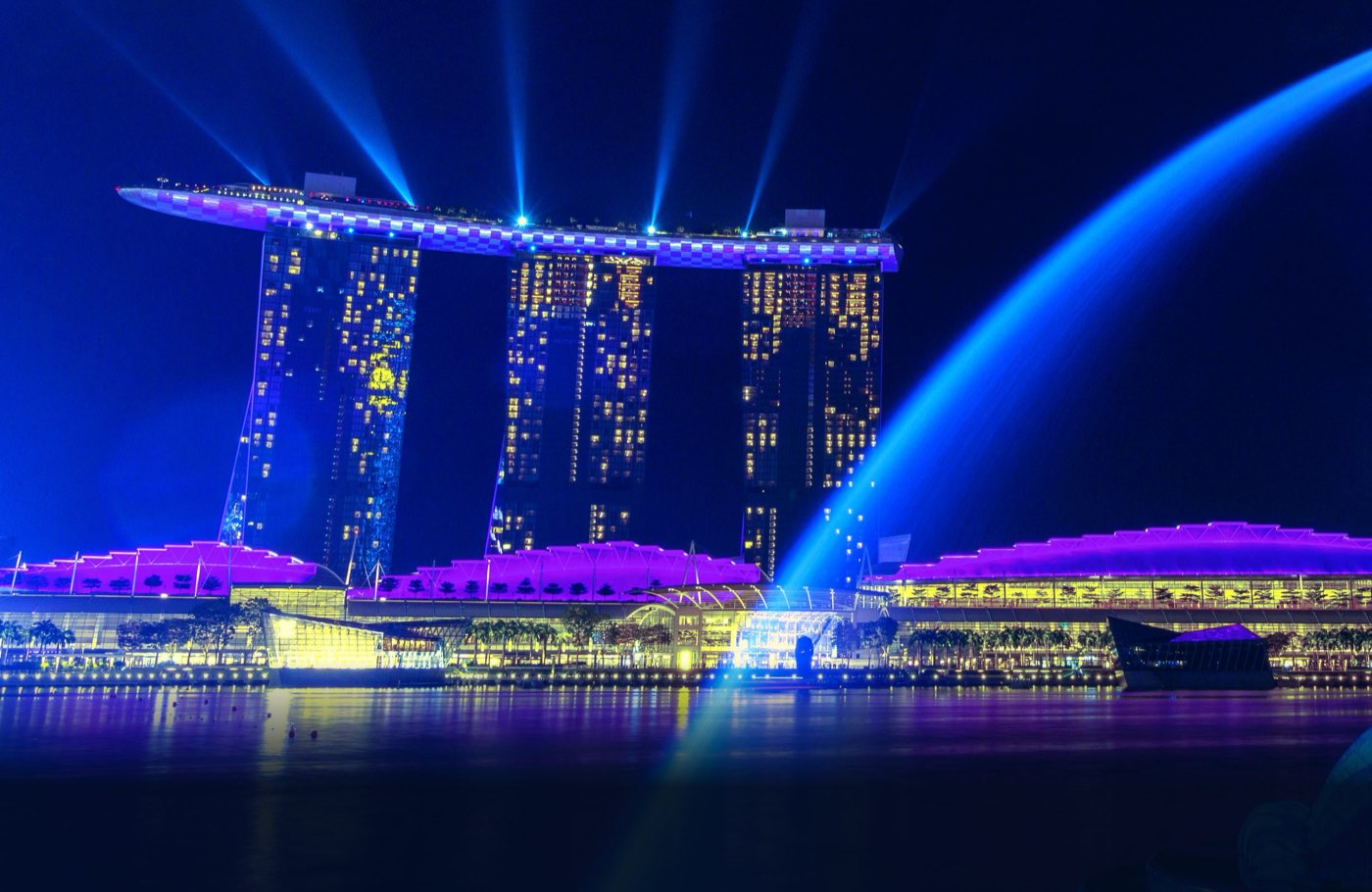 Singapore’s waterfront at night, the published dossier’s own cover frame